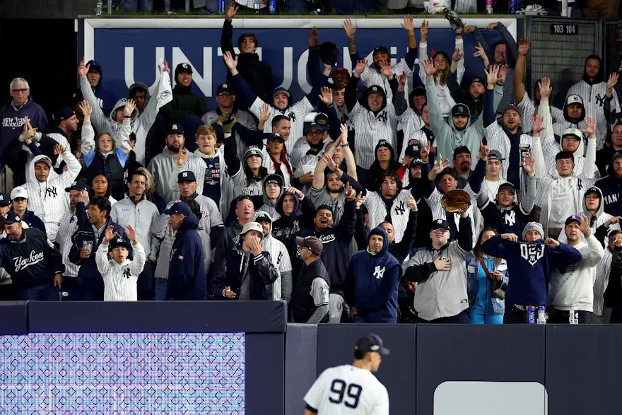 New York Yankees fans cheer during the eighth inning against the Cleveland Guardians in Game 5 of the American League Division Series as we look at the New York Sports betting scene hitting $1 billion in June.