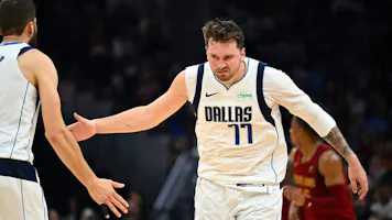 Luka Doncic #77 of the Dallas Mavericks reacts as we look at the latest NBA Finald odds.