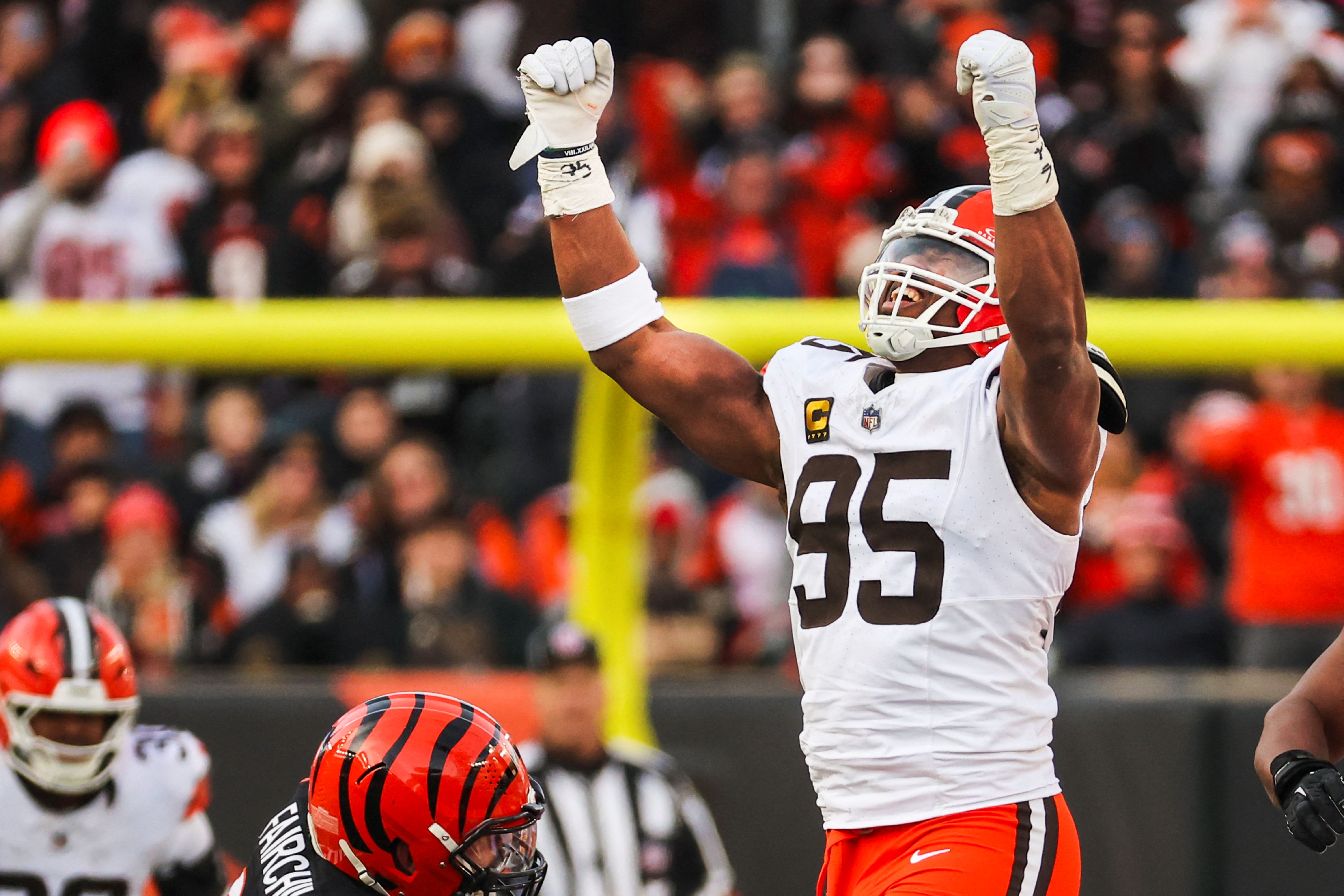 Cleveland Browns defensive end Myles Garrett celebrates, and he's key as we look at the NFL defensive player of the year odds