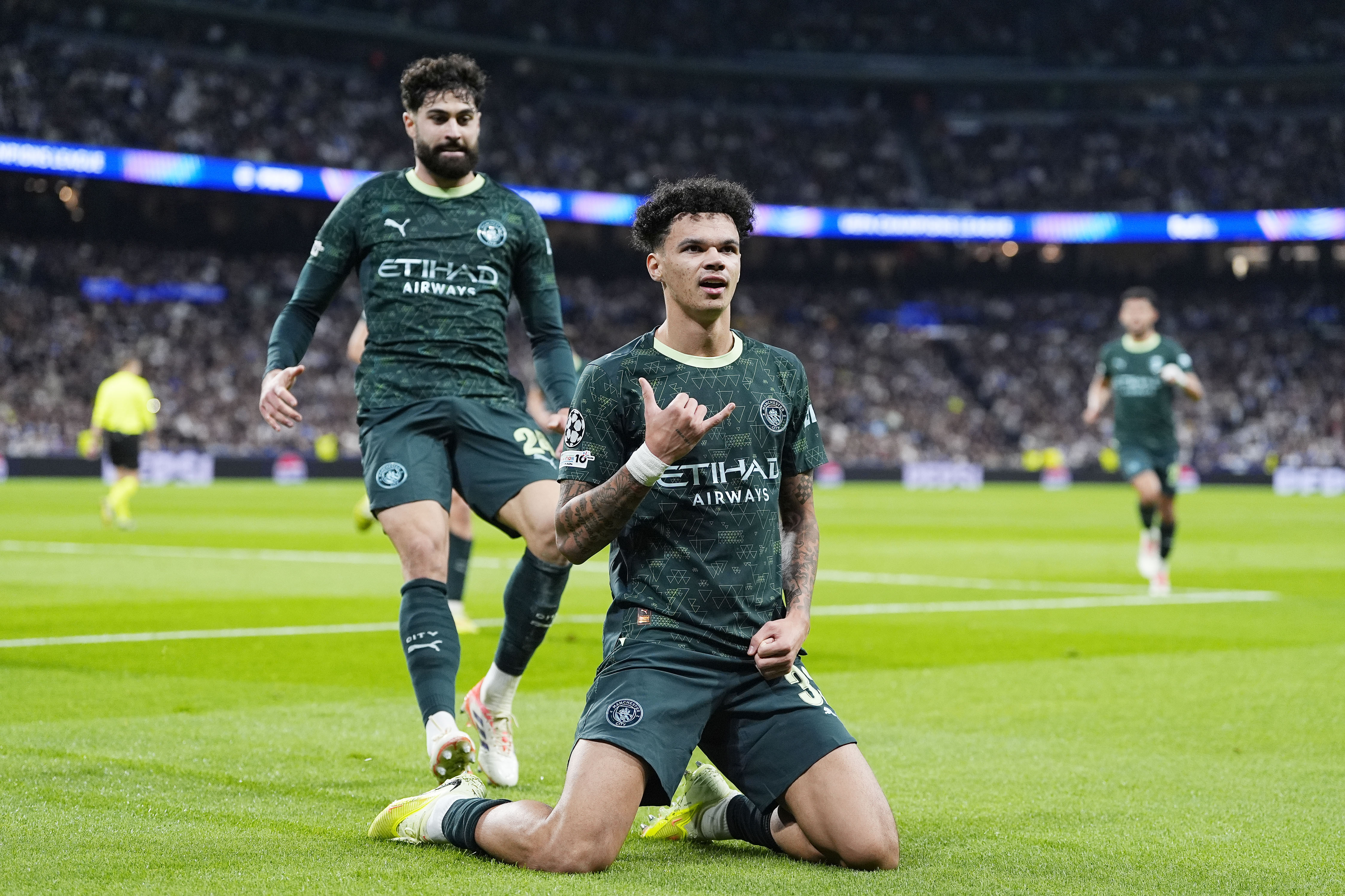 Nico O'Reilly of Manchester City celebrates a goal as we make our best Crystal Palace vs. Man City prediction.