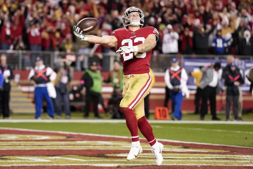 Christian McCaffrey #23 of the San Francisco 49ers celebrates after rushing for a touchdown against the Dallas Cowboys during the fourth quarter in the NFC Divisional Playoff game at Levi's Stadium on Jan. 22. 