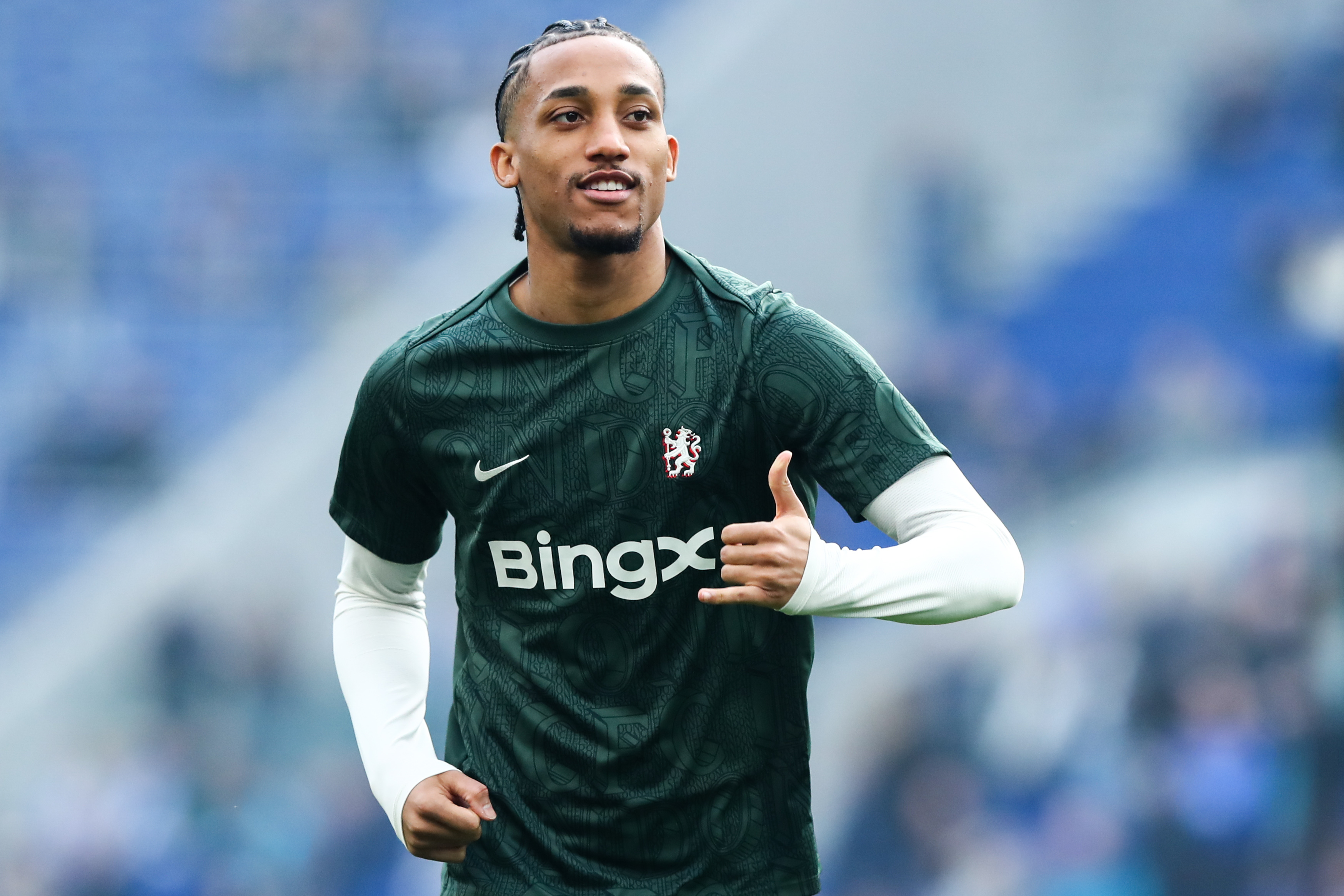 Joao Pedro of Chelsea warms up as we break down our Chelsea vs. Manchester United prediction.