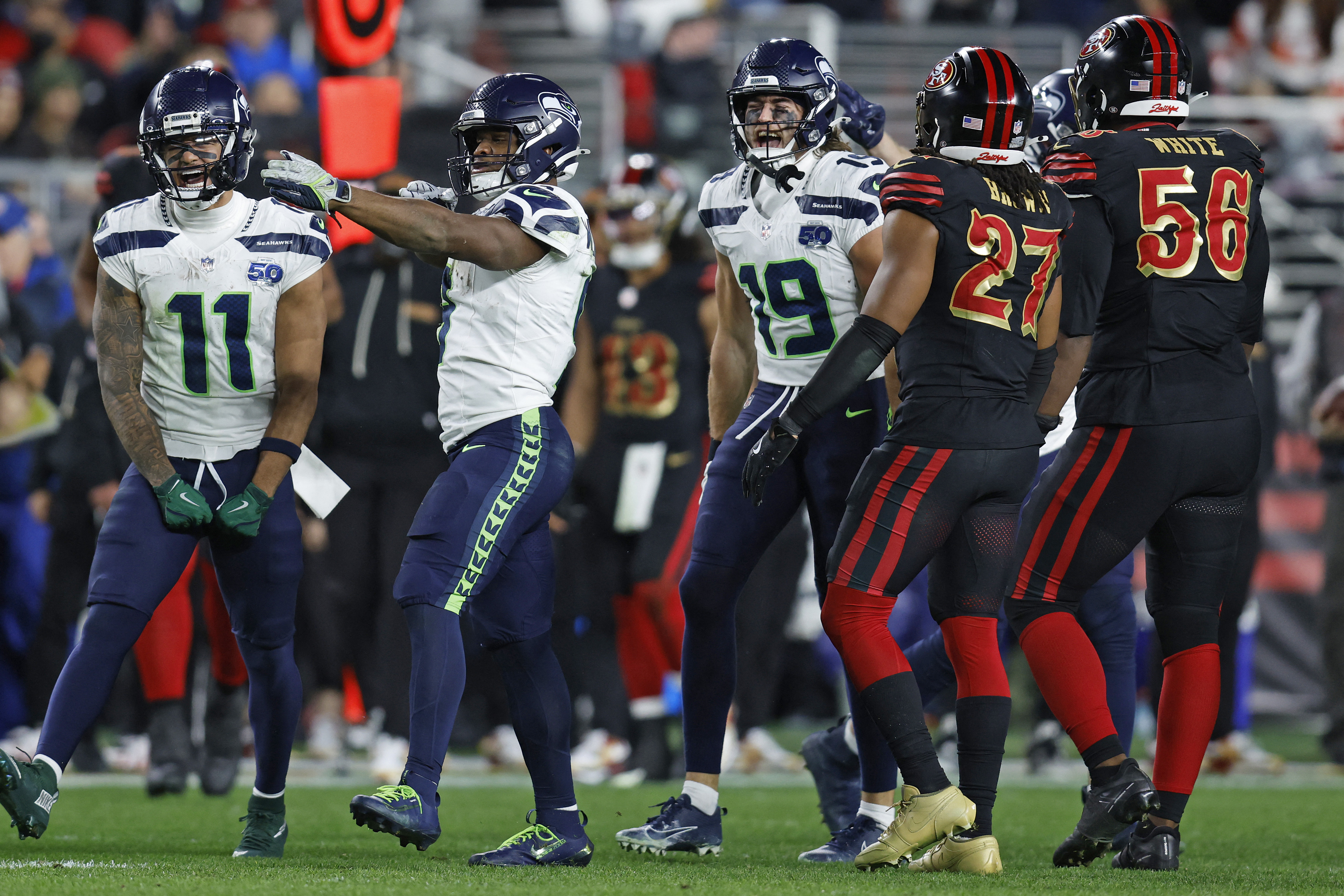 Seattle Seahawks running back Kenneth Walker III (9) reacts against the San Francisco 49ers as we break down our NFL Divisional Round predictions.