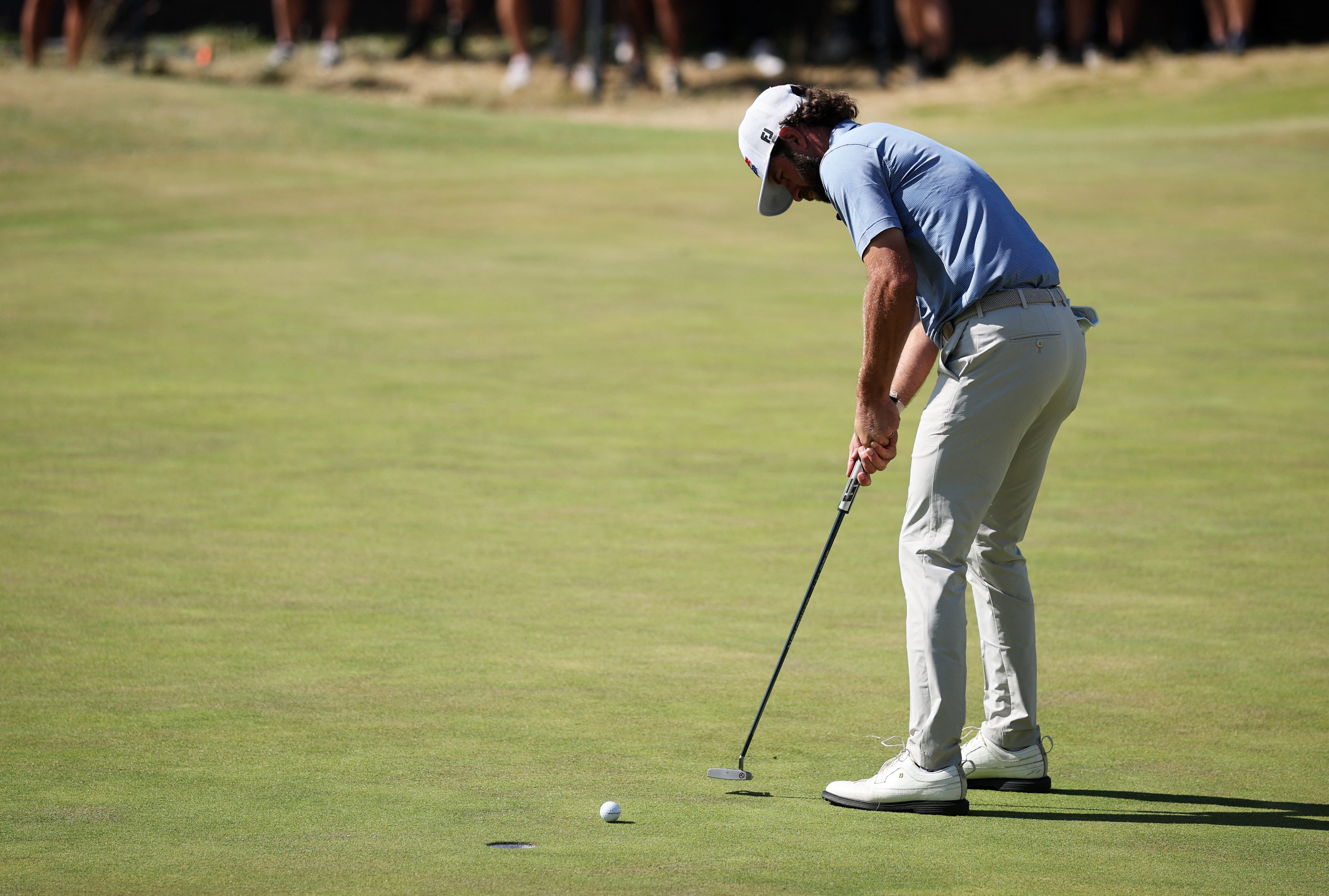Cameron Young of the U.S. holes his final putt as he is featured in our Rocket Classic odds.