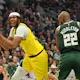 Myles Turner (33) of the Indiana Pacers works against Khris Middleton (22) of the Milwaukee Bucks, as we offer our best Bucks vs. Pacers player props for Game 6 on Thursday.