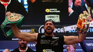Tyson Fury reacts during his weigh-in at Wembley Stadium as we provide a look at the best Fury vs. Ngannou odds