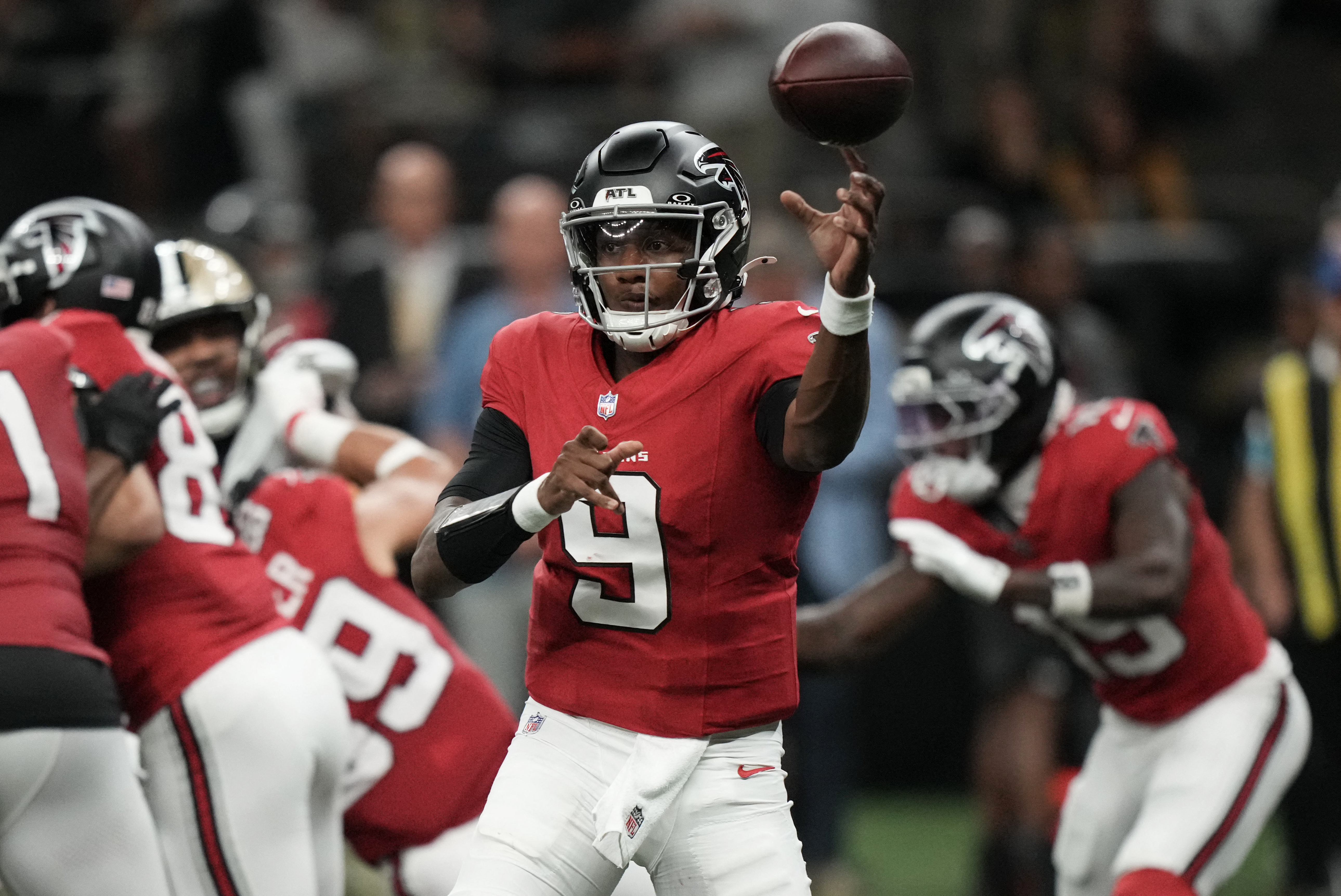 Falcons quarterback Michael Penix Jr. (9) passes as we break down our Ravens vs. Falcons expert picks.