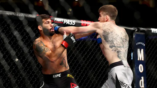 Cory Sandhagen punches Raphael Assuncao during their Bantamweight Bout at UFC 241 at Honda Center on Aug. 17, 2019 in Anaheim, California.