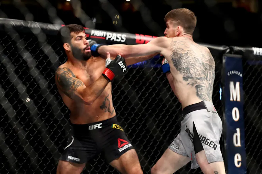 Cory Sandhagen punches Raphael Assuncao during their Bantamweight Bout at UFC 241 at Honda Center on Aug. 17, 2019 in Anaheim, California.