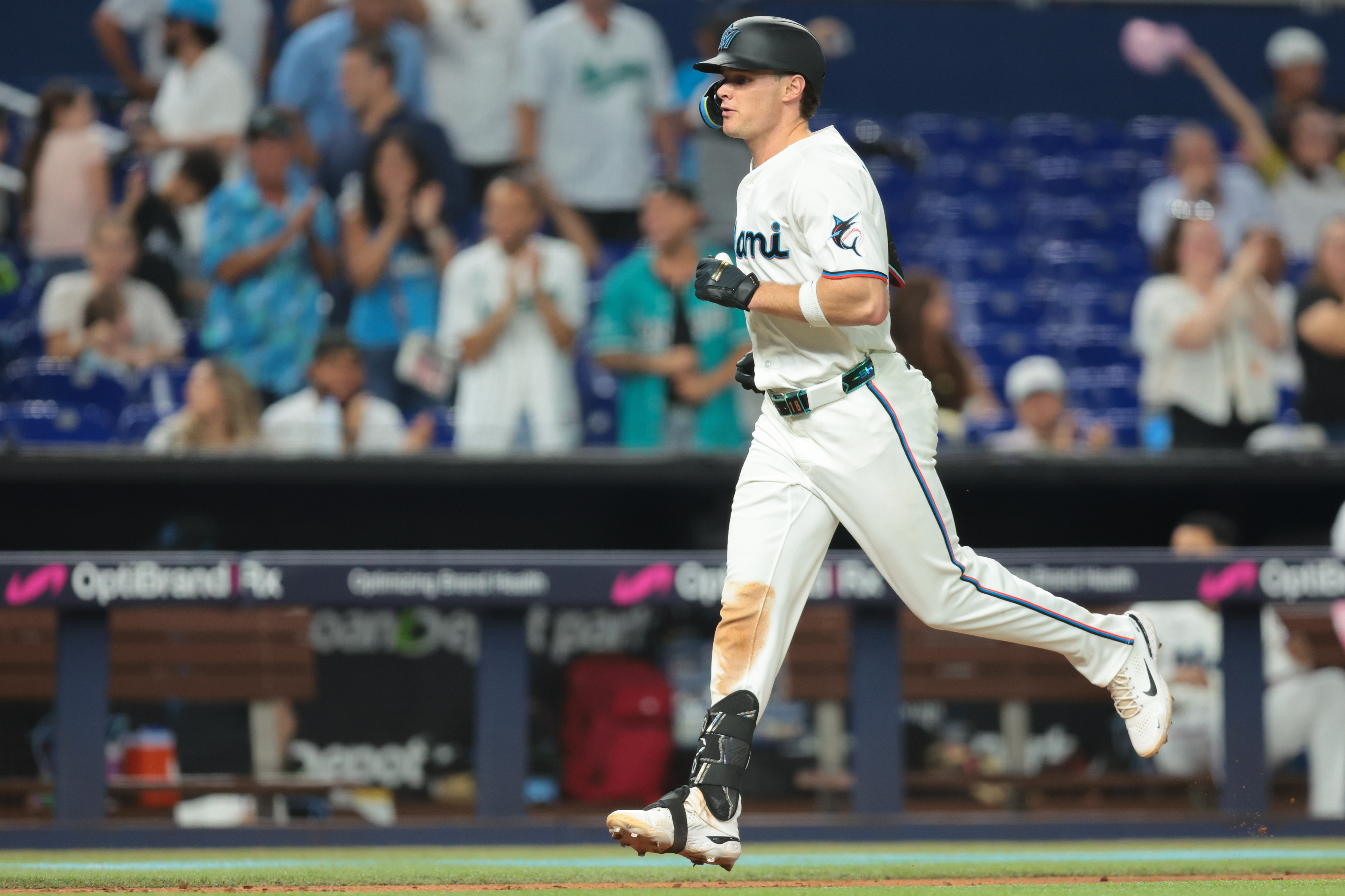 Miami Marlins right fielder Griffin Conine (18) scores after hitting a home run as he is featured in our MLB best home run predictions today.