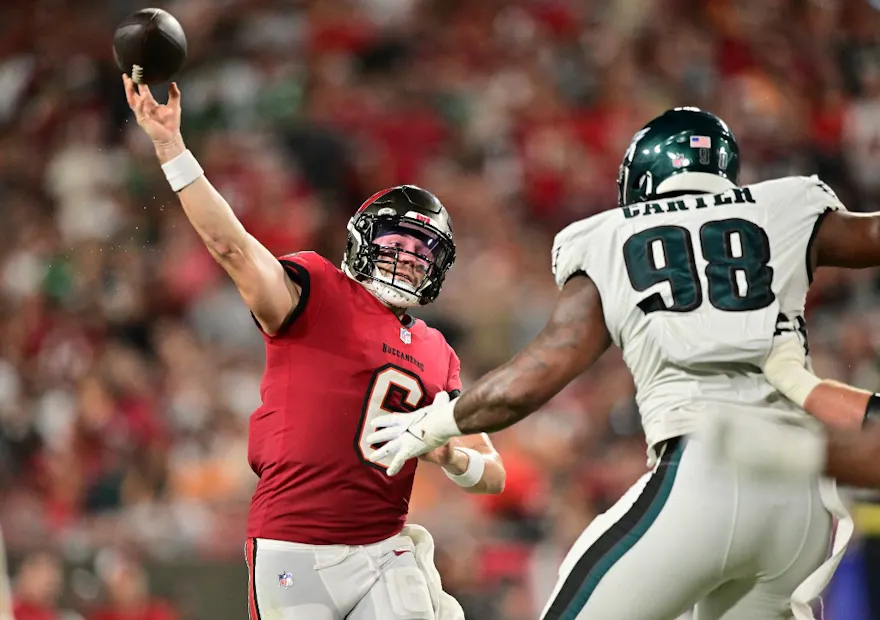 Baker Mayfield #6 of the Tampa Bay Buccaneers throws a pass under pressure from Jalen Carter #98 of the Philadelphia Eagles as we make our Baker Mayfield NFL player props predictions for Eagles vs. Buccaneers on Monday as part of NFL Wild Card Weekend.