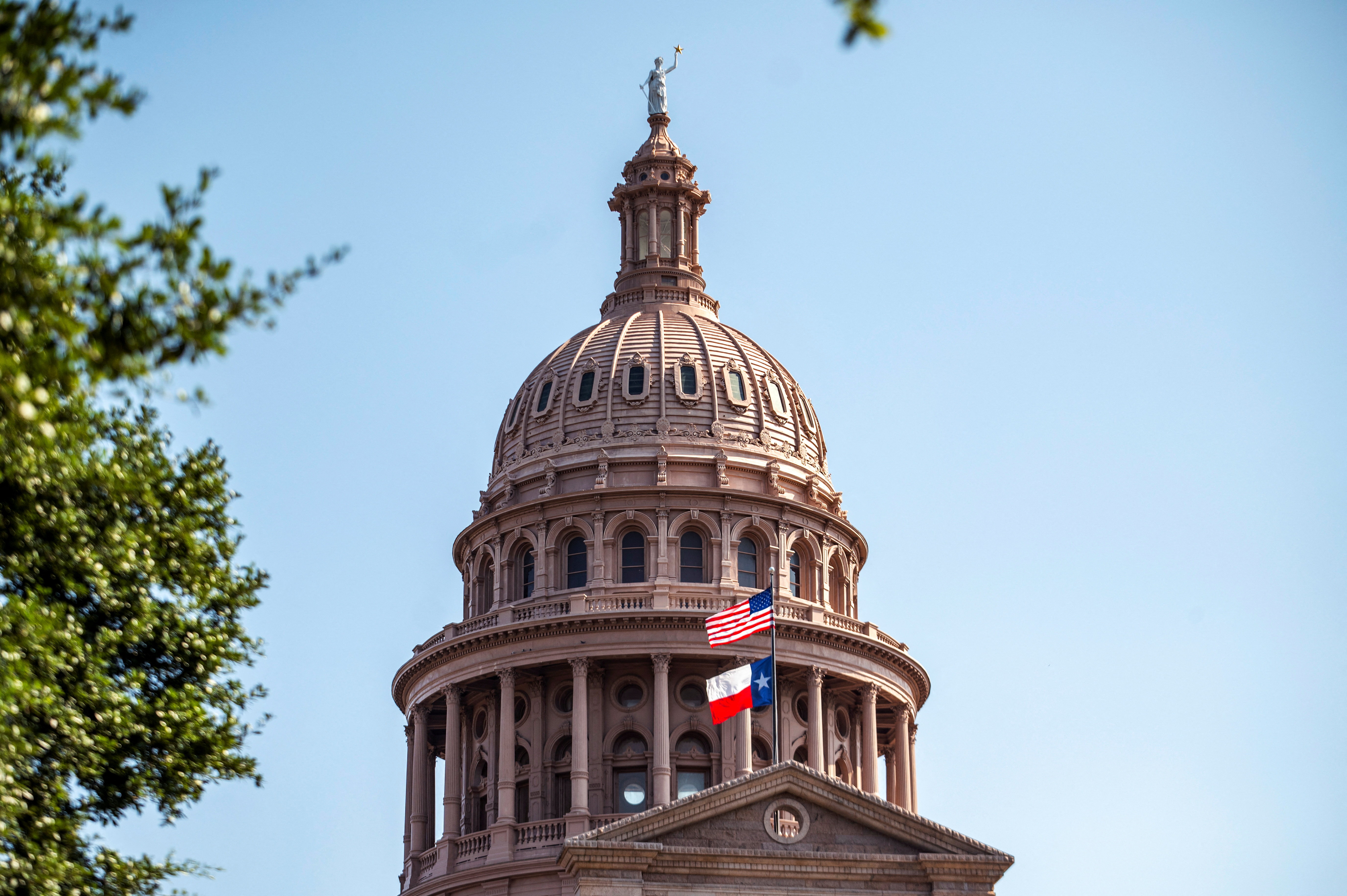The U.S. and Texas state flags fly as we look at the state considering the push for legal sports betting (again).