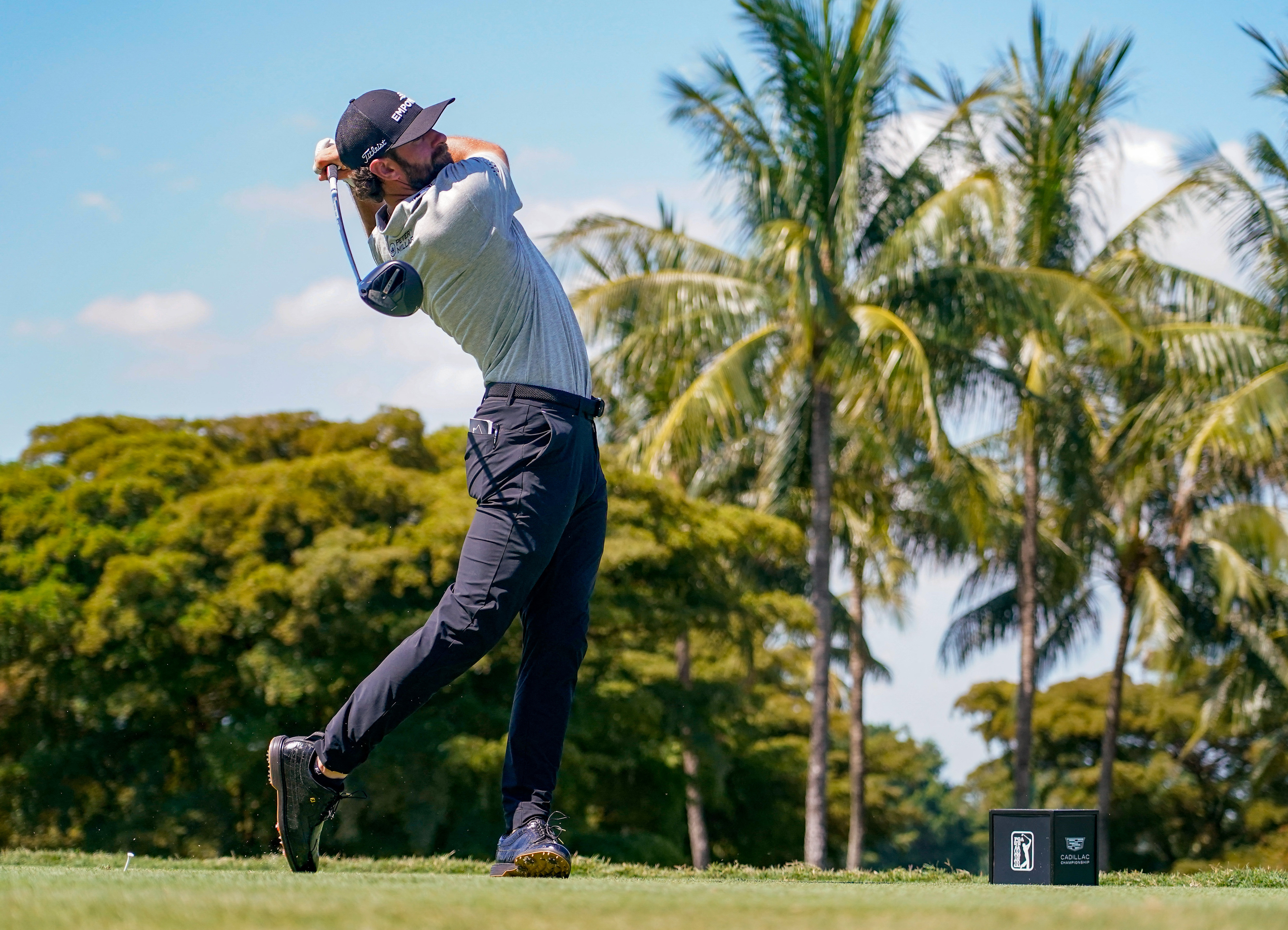 Cameron Young plays his tee shot on the eighth hole as he is featured in our Cadillac Championship Round 4 picks & predictions.