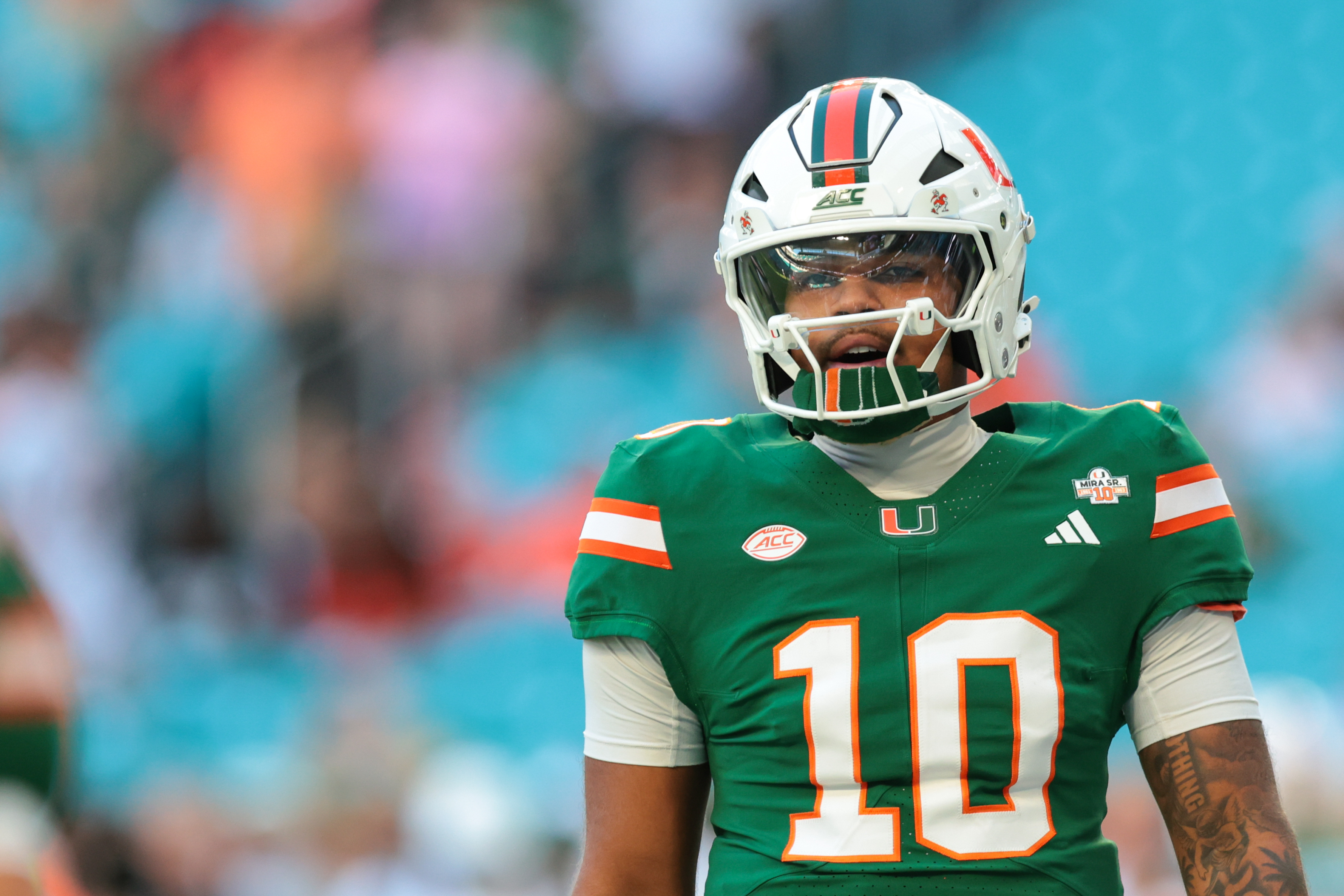 Miami Hurricanes quarterback Darian Mensah (10) looks on as he is featured in our Miami vs. Clemson expert picks.