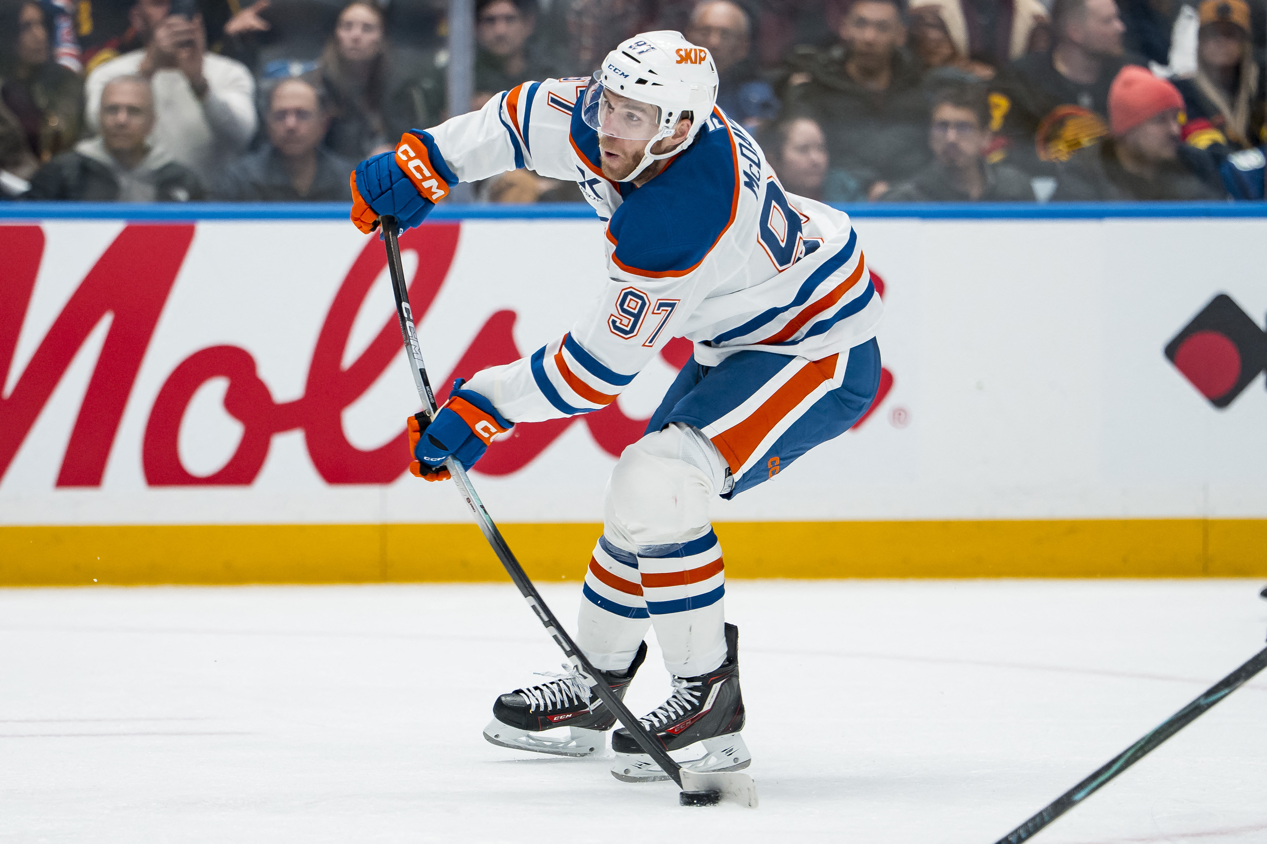 Edmonton Oilers forward Connor McDavid (97) shoots the puck as we offer our Devils vs. Oilers prediction.