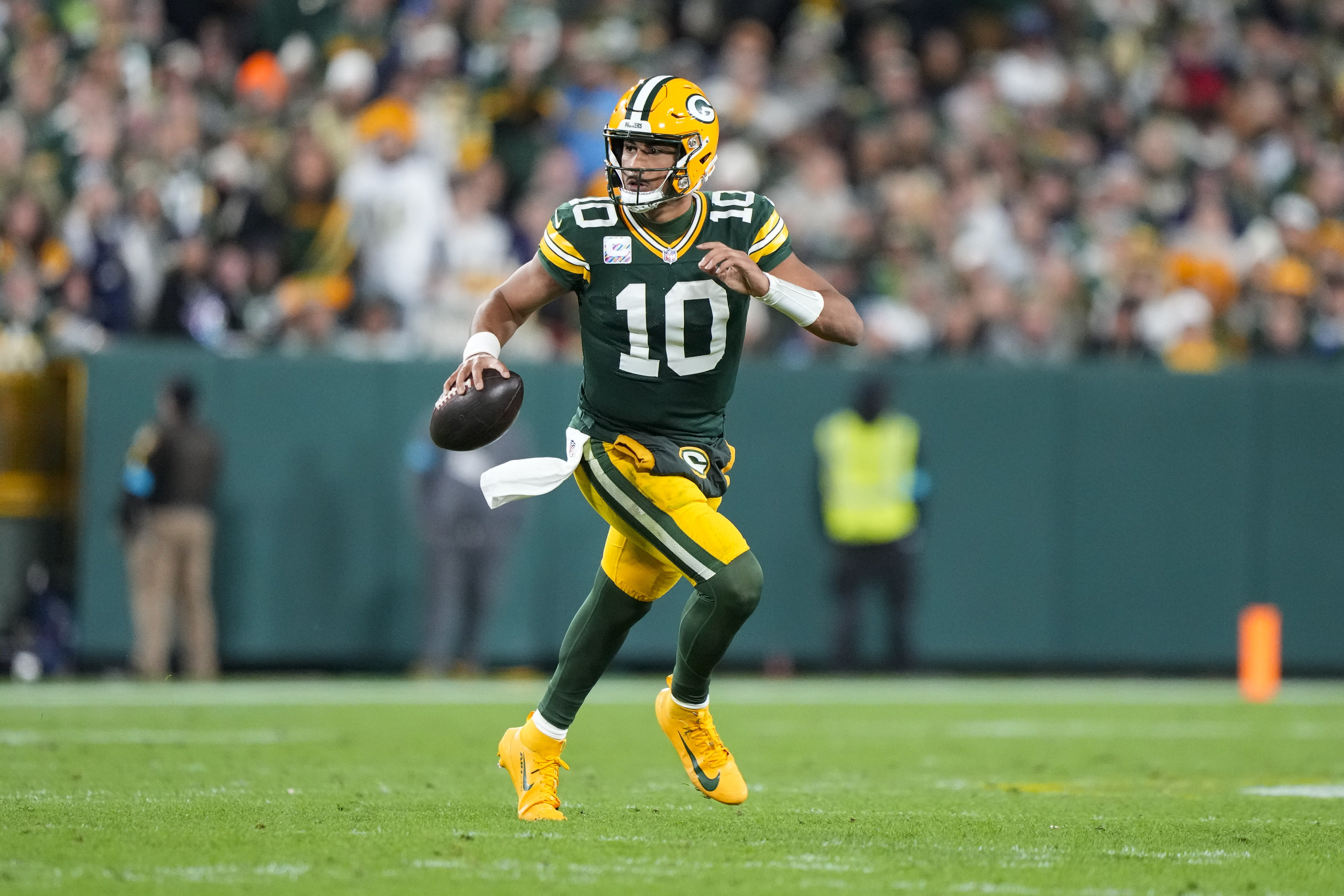 Green Bay Packers quarterback Jordan Love looks to throw as we make our best NFL player prop bets for Week 7