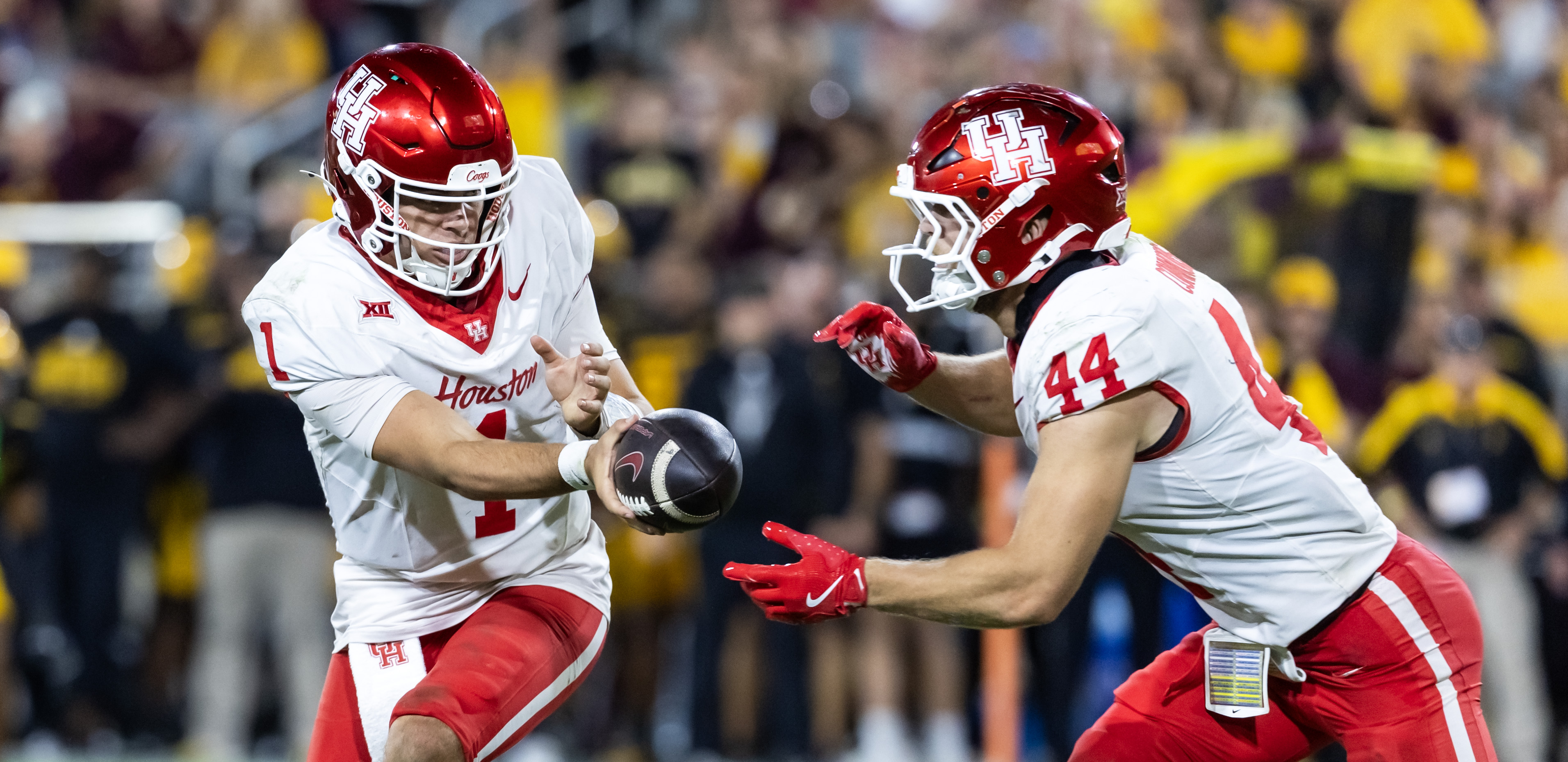  Conner Weigman (1) hands off the ball to running back Dean Connors (44)as we make our best college football underdog prediction