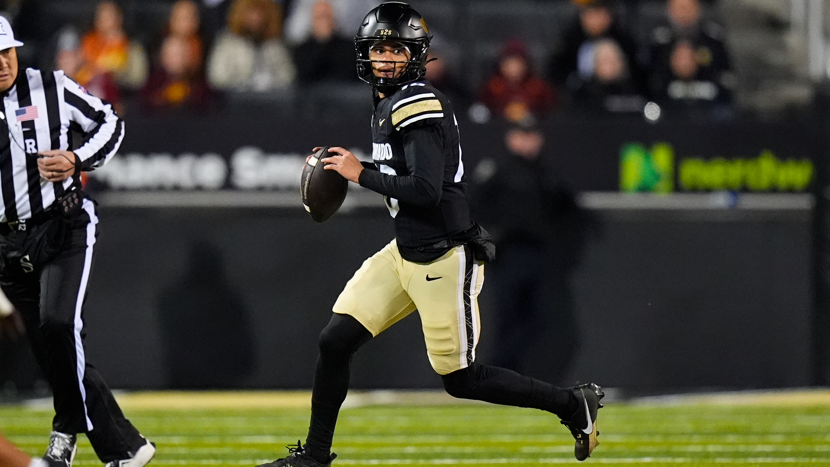 Colorado Buffaloes quarterback Julian Lewis scrambles as we make our best Colorado vs. Georgia Tech player prop.