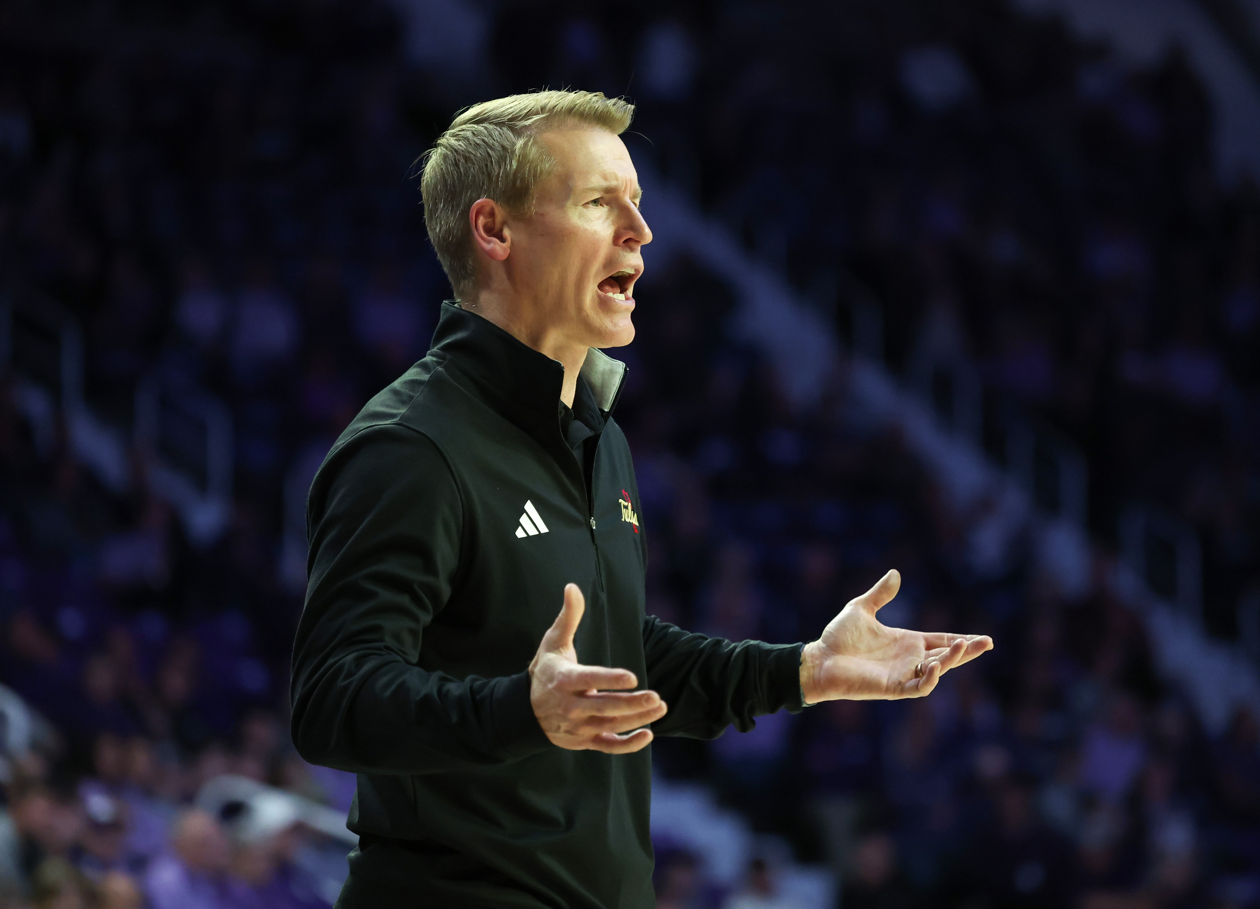 Tulsa Golden Hurricane head coach Eric Konkol yells at his team as we break down our New Mexico vs. Tulsa prediction & parlay today.