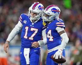Josh Allen #17 of the Buffalo Bills and Stefon Diggs #14 of the Buffalo Bills celebrate after a touchdown during the second quarter against the Cleveland Browns at Ford Field on Nov. 20.