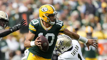 Jordan Love #10 of the Green Bay Packers is the focus of our Jordan Love player props