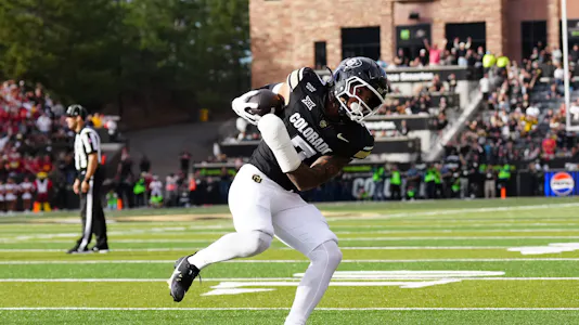 Colorado Buffaloes defensive back Tawfiq Byard (7) pulls in an interception as we make our Colorado vs. Utah Prediction.