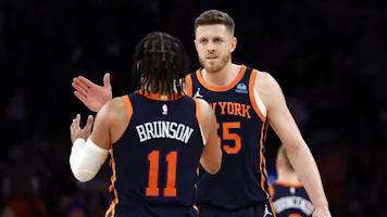 New York Knicks starters Isaiah Hartenstein (55) and Jalen Brunson (11) react as we offer our best Knicks vs. 76ers player props for Game 3 on Thursday.