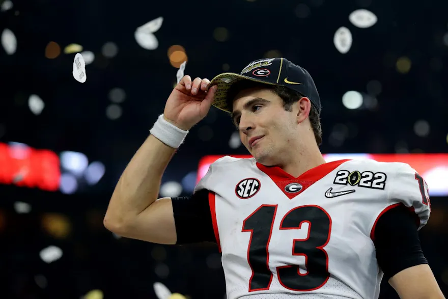 Stetson Bennett #13 of the Georgia Bulldogs celebrates after the Georgia Bulldogs defeated the Alabama Crimson Tide 33-18 in the 2022 CFP National Championship Game on Jan. 10, 2022.