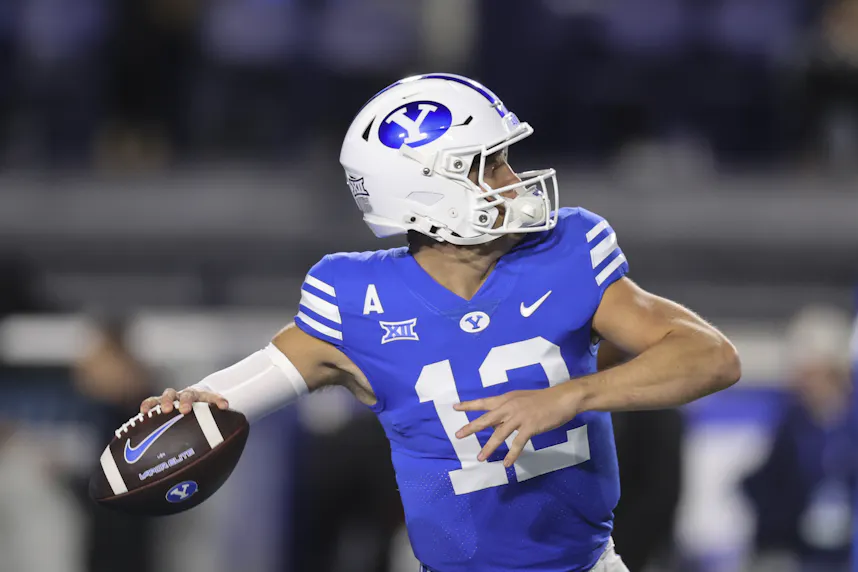 BYU quarterback Jake Retzlaff warms up before the game against the Oklahoma State. We're backing the Cougars in our college football Week 11 picks against the spread.