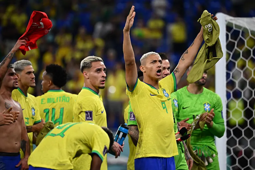 Brazil's Richarlison celebrates with supporters after his side defeated Switzerland.