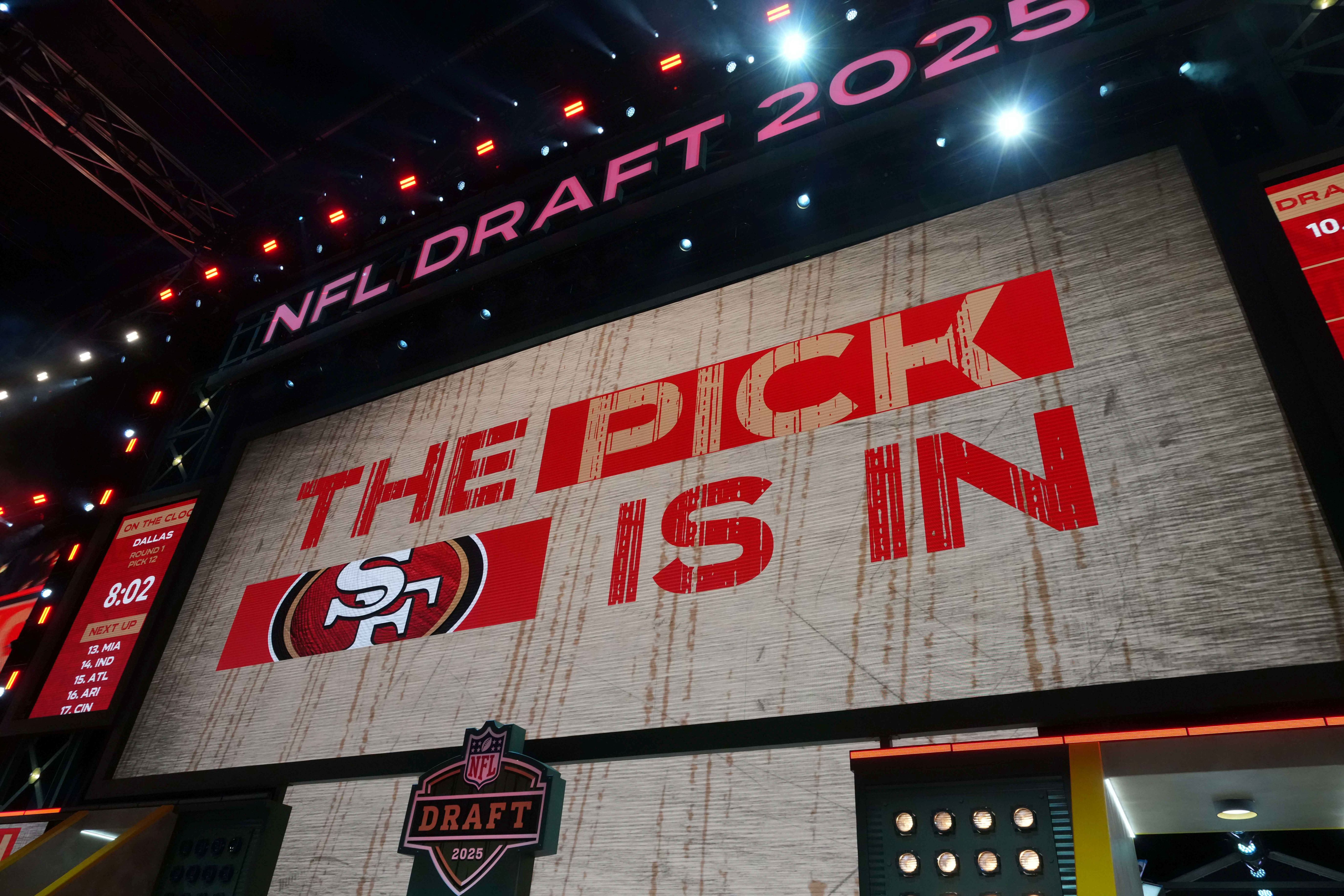 The San Francisco 49ers logo is projected on the video board during the NFL Draft at Lambeau Field.