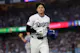 Los Angeles Dodgers designated hitter Shohei Ohtani runs back to the dugout after getting an out on a pick-off play during the third inning at Dodger Stadium as we look at our Dodgres-Yankees player props.