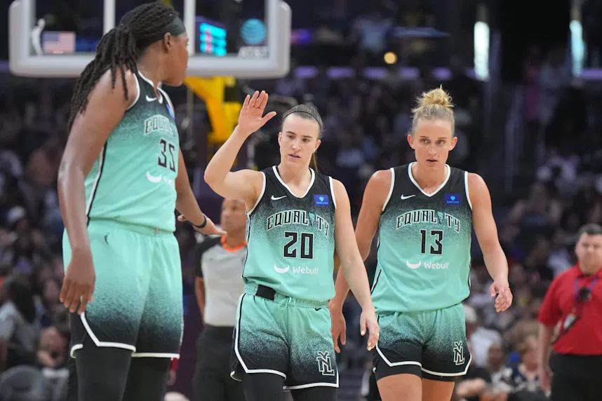 New York Liberty forward Jonquel Jones (35), guard Sabrina Ionescu (20) and forward Leonie Fiebich (13) react as we offer our best Liberty vs. Aces prediction and expert picks for Saturday's WNBA matchup at Michelob ULTRA Arena in Paradise, Nev.