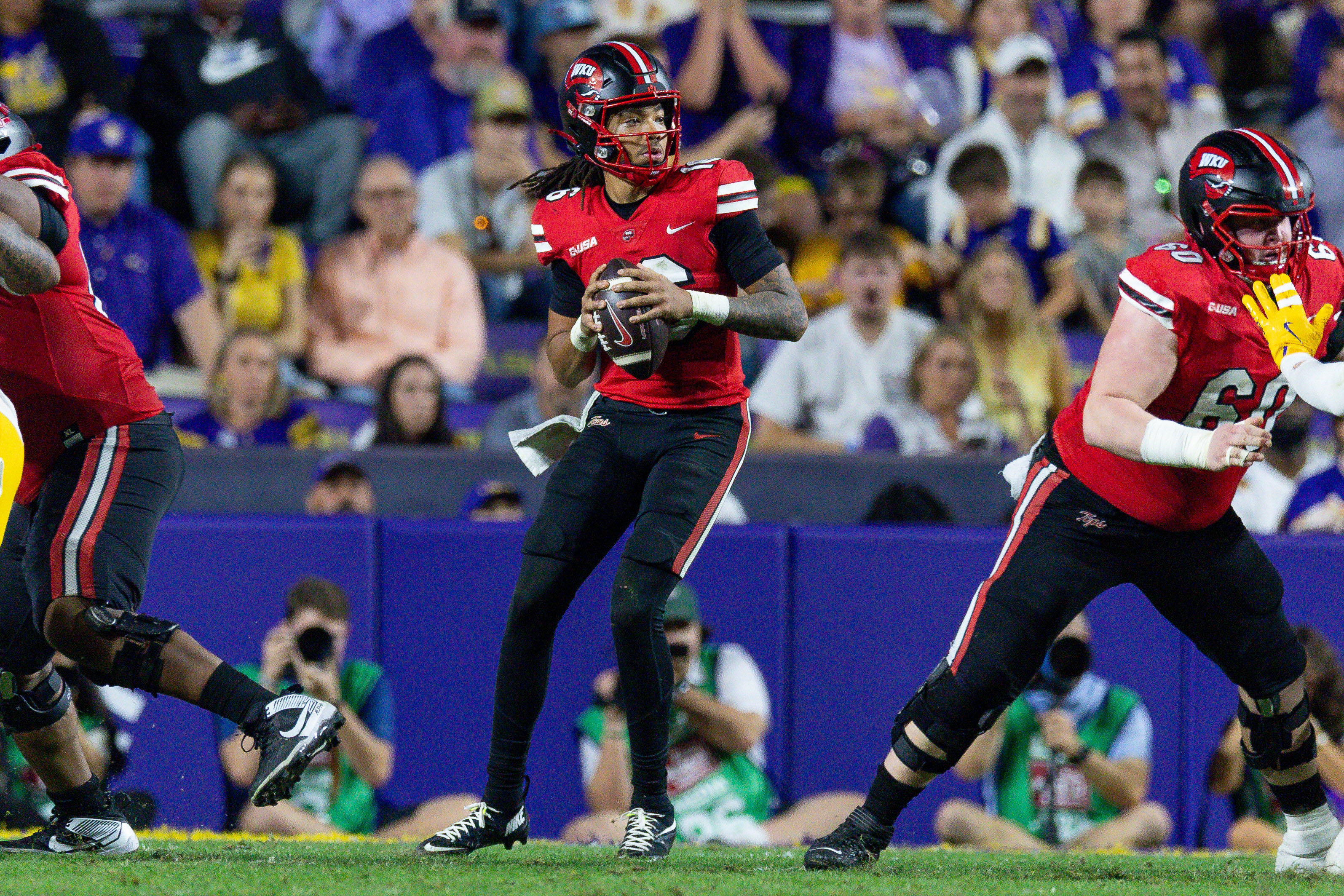 Western Kentucky QB Rodney Tisdale Jr. drops back to pass as we make our best Western Kentucky vs. New Mexico State prediction