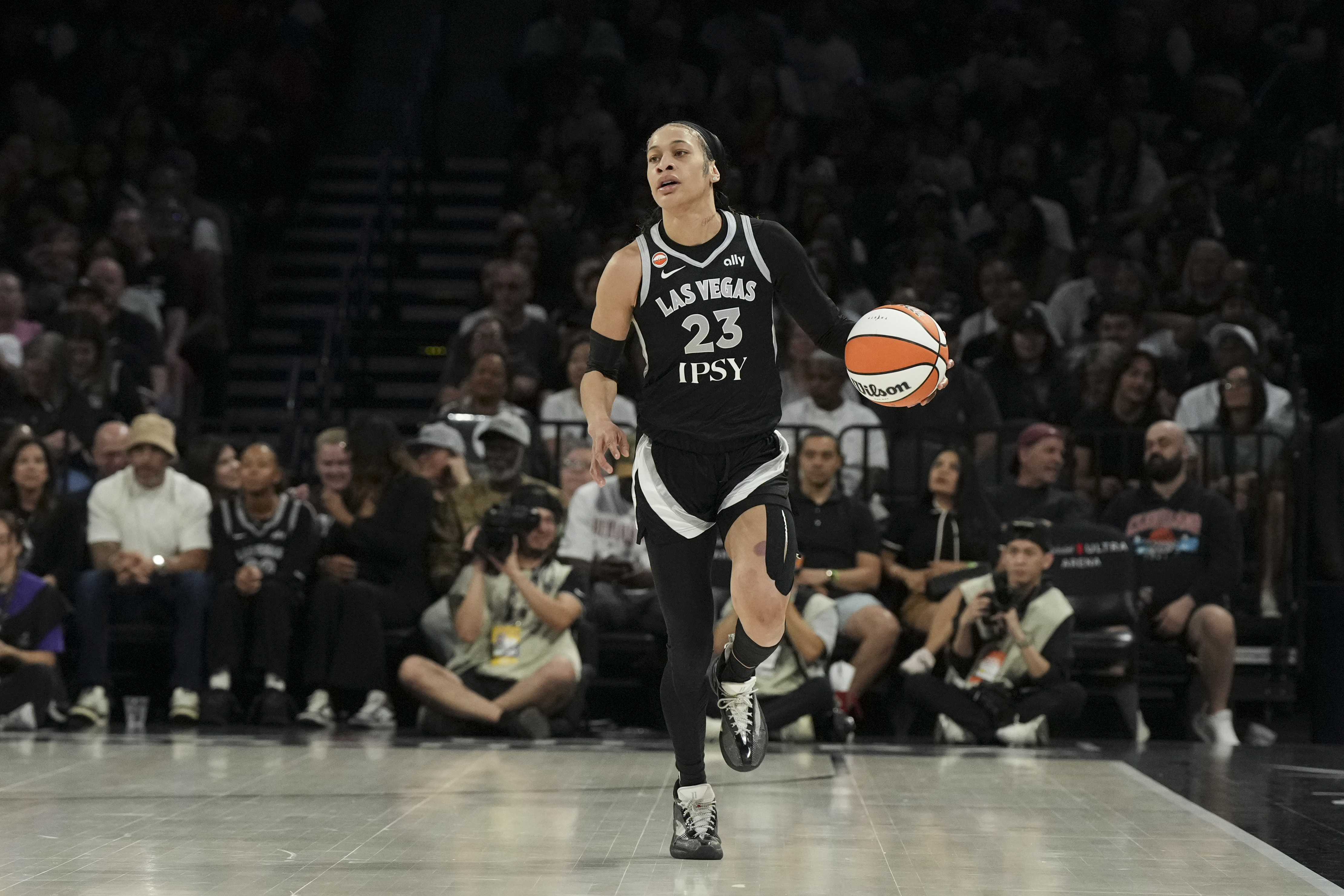 Las Vegas Aces guard Chennedy Carter dribbles as we make our best Aces vs. Valkyries prediction