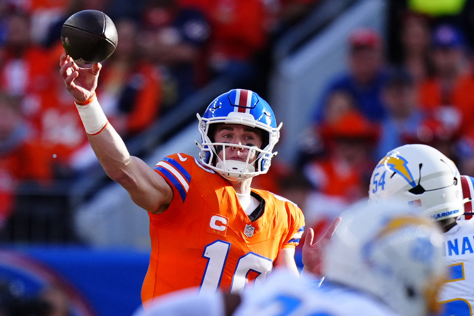 Bo Nix throws the ball as we offer our Bills vs. Broncos prediction and odds. 