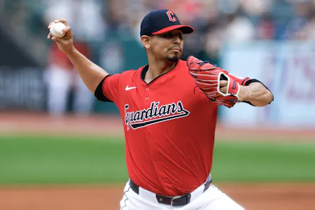 Carlos Carrasco #59 of the Cleveland Guardians pitches against the Los Angeles Angels as we look at our best MLB player props and expert picks for Wednesday