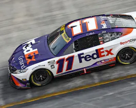 Denny Hamlin, driver of the #11 FedEx Ground Toyota, drives during qualifying for the NASCAR Cup Series Bass Pro Shops Night Race at Bristol Motor Speedway on Sept. 16.