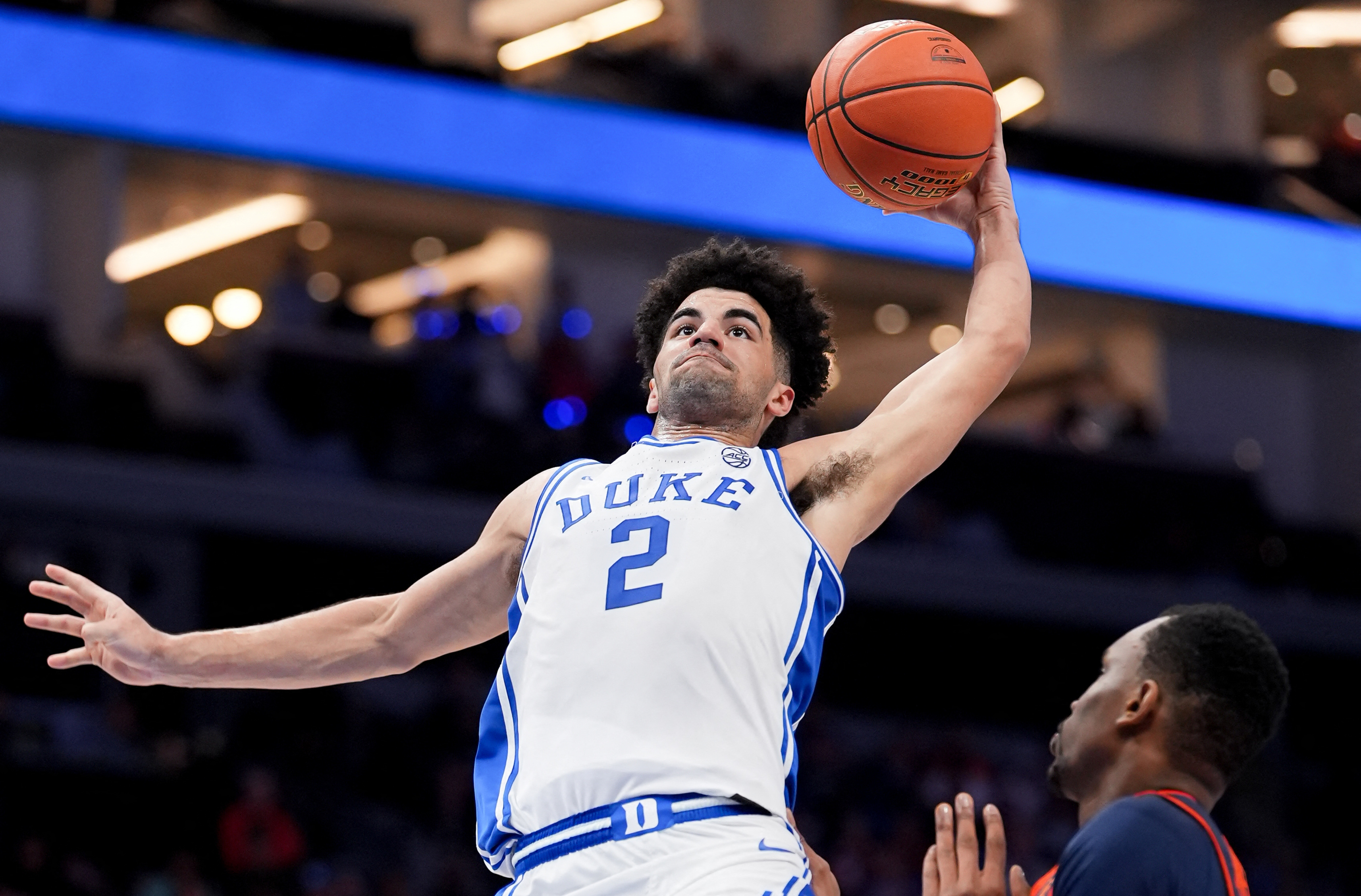 Duke guard Cayden Boozer (2) goes up for a dunk as we look at our Siena vs. Duke prediction and parlay today