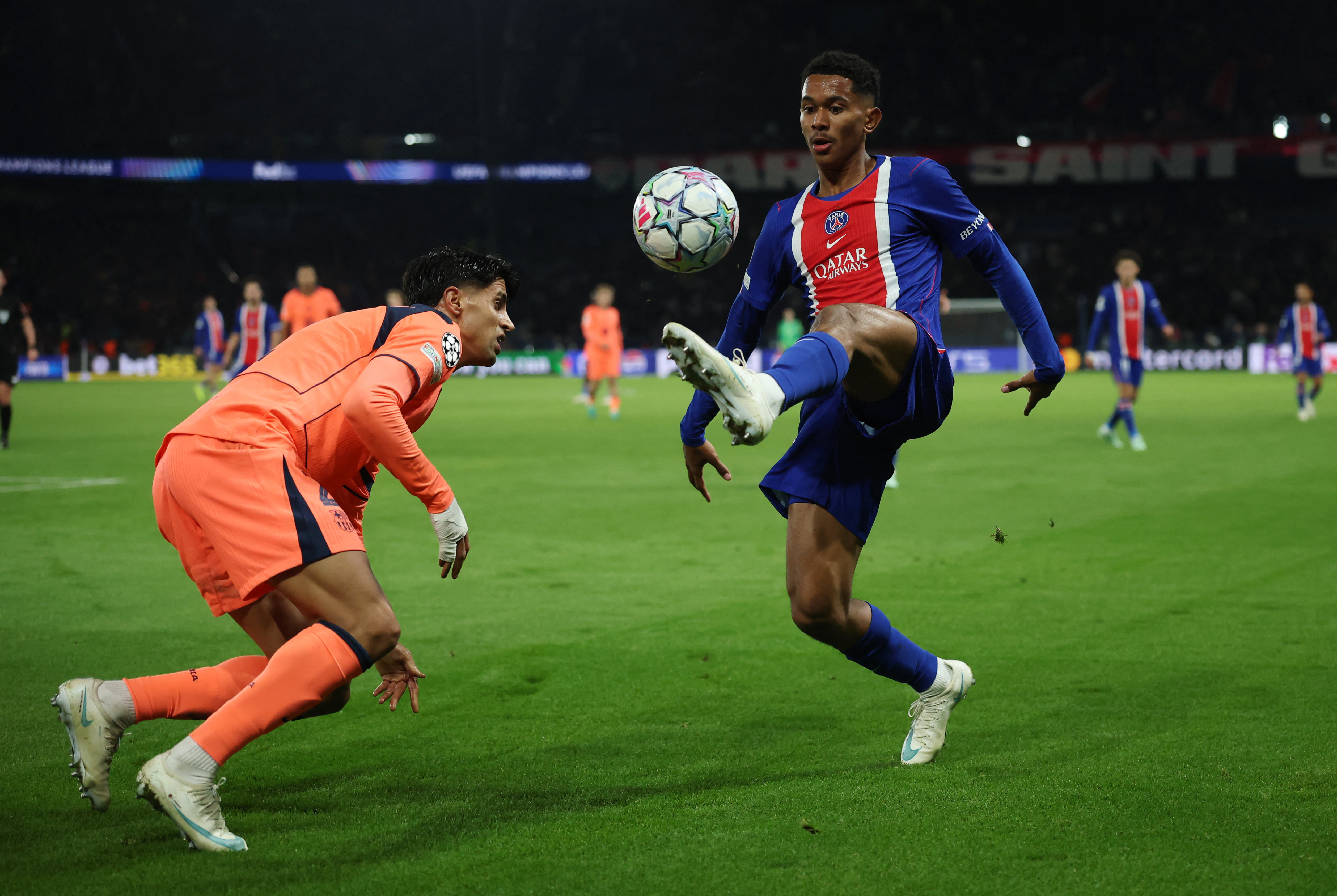 PSG's Senny Mayulu in action with FC Barcelona's Joao Cancelo as we look at the updated 2026-27 Champions League odds.