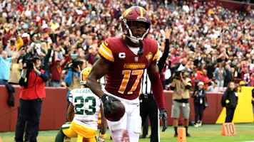 Terry McLaurin celebrates after catching a touchdown reception during the third quarter of the game against the Green Bay Packers, and we offer our top NFL upset picks based on the best NFL odds.