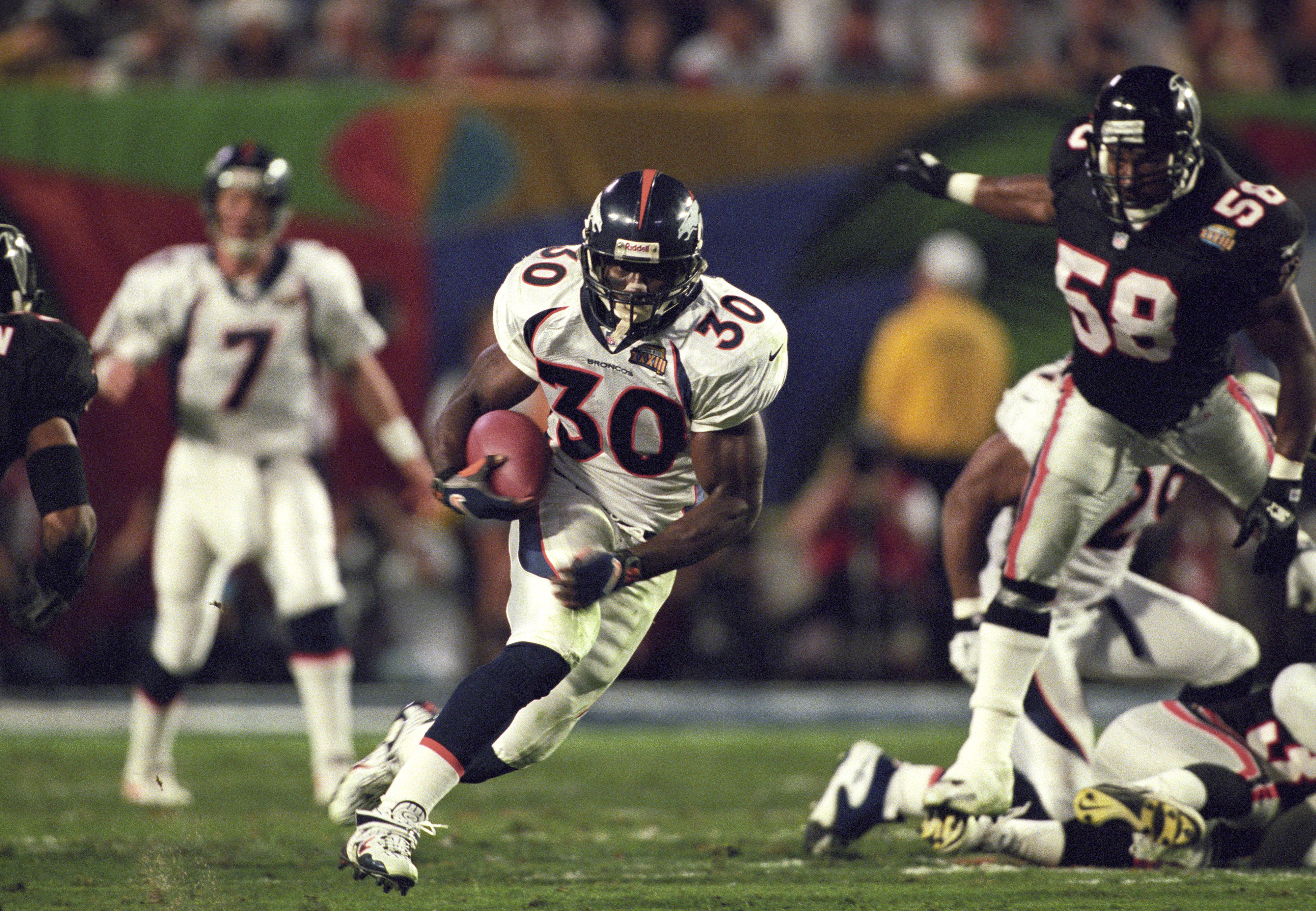 Saquon Barkley can break the NFL rushing record set by Terrell Davis (30) as we examine Barkley's stats, odds & prop bets for Super Bowl 2025.