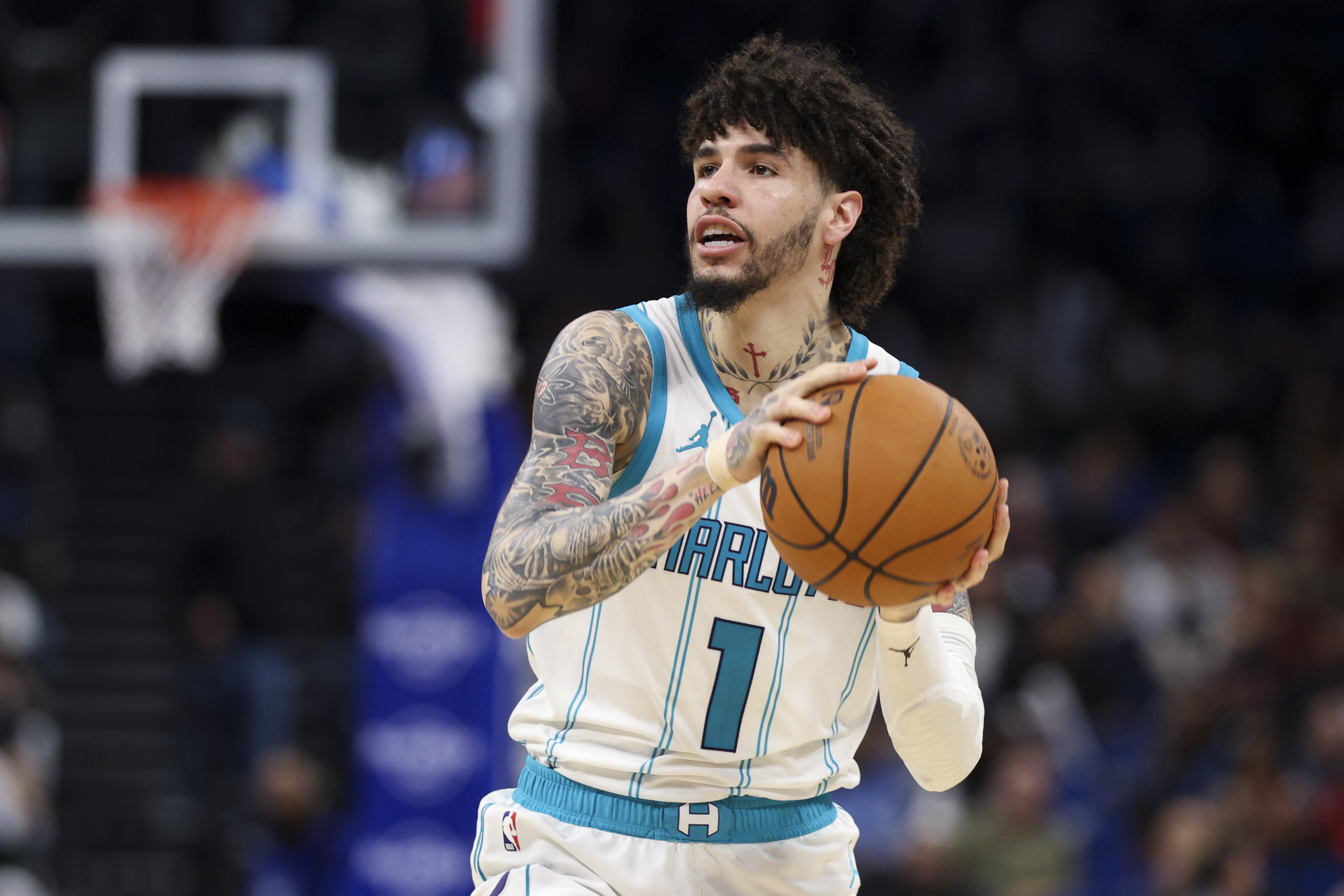 Charlotte Hornets guard LaMelo Ball (1), seen here looking to shoot during a game, is featured in our Hornets vs. Magic prediction.