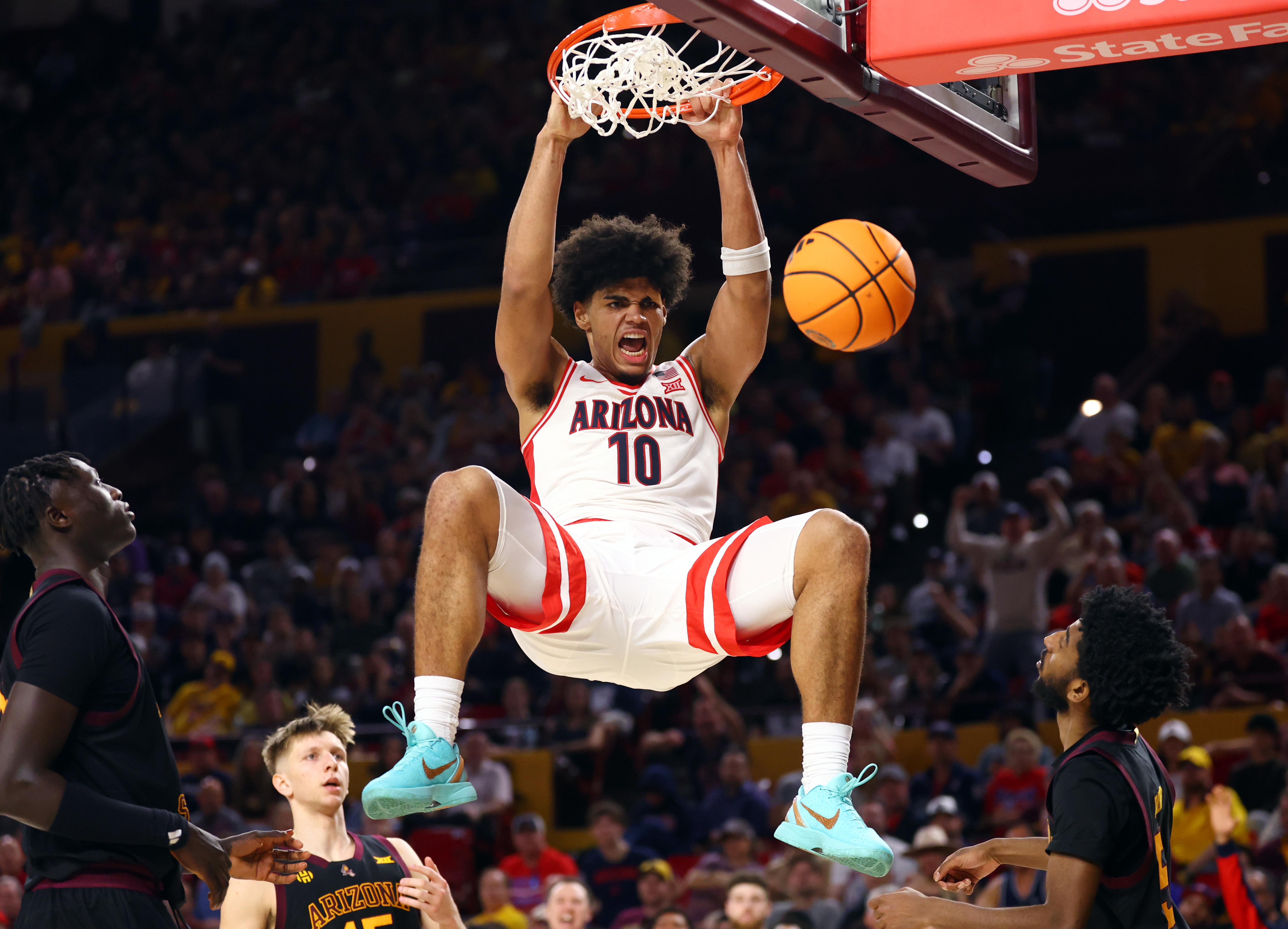Arizona's Koa Peat is key to our Arizona vs. Kansas prediction for tonight's top 10 showdown. 