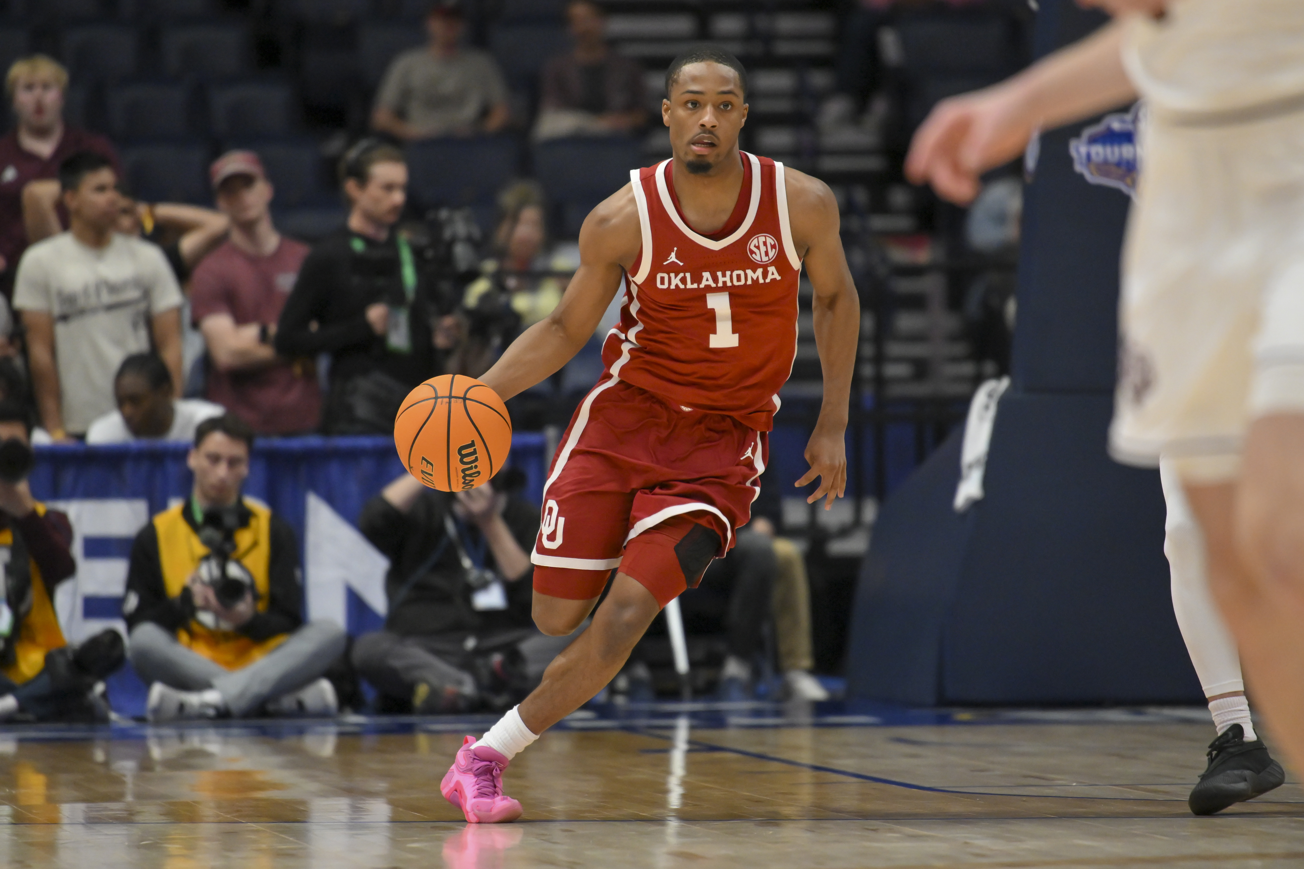 Oklahoma's Xzayvier Brown is key to our Oklahoma vs. West Virginia prediction for the College Basketball Crown Championship Game. 