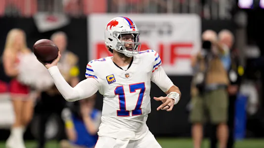 Pictured: Buffalo Bills quarterback Josh Allen (17) throws downfield as we offer our Bills vs. Panthers player prop bets.
