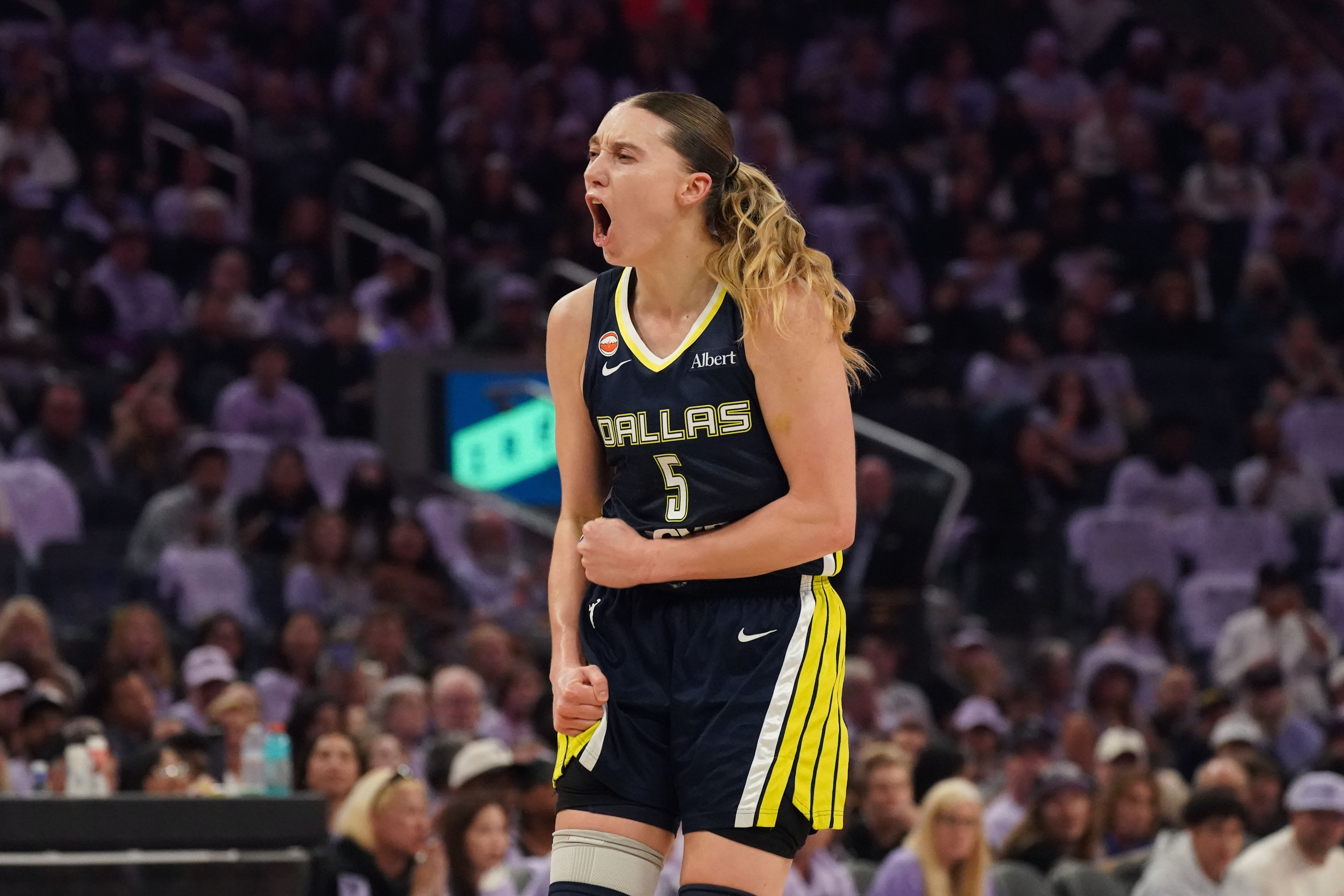 Dallas Wings guard Paige Bueckers (5) celebrates after making a basket as she is featured in our Valkyries vs. Wings prediction.
