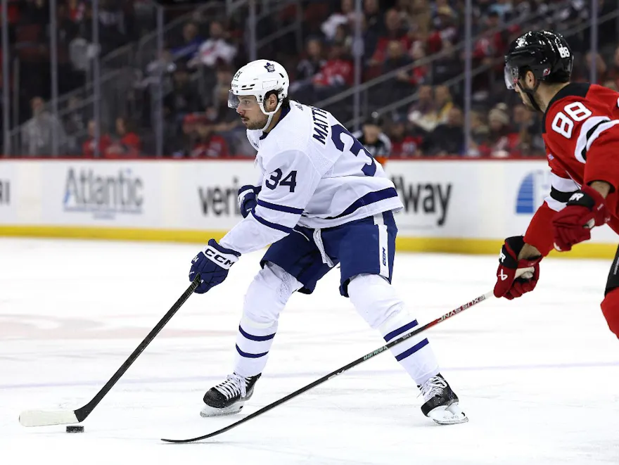 Auston Matthews #34 of the Toronto Maple Leafs takes the puck during the first period against the New Jersey Devils as we make our best Maple Leafs vs. Panthers picks for Tuesday's game in Florida.