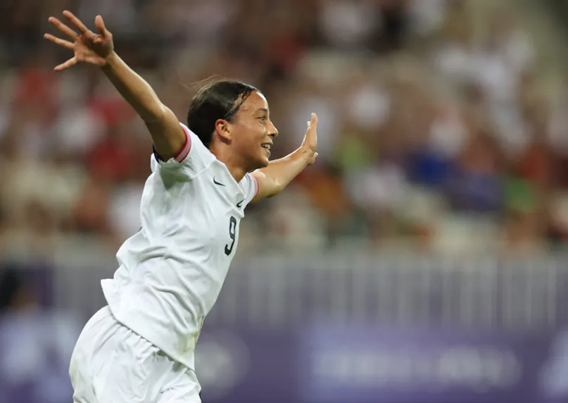 Mallory Swanson celebrates scoring against Zambia as we look at the best bets and predictions for the USA vs. Germany Olympic soccer tilt.