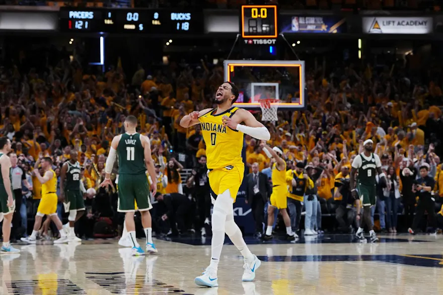 Tyrese Haliburton of the Indiana Pacers celebrates after beating the Milwaukee Bucks 121-119 in overtime during Game 3. We're backing Haliburton in our Pacers vs. Bucks player props.